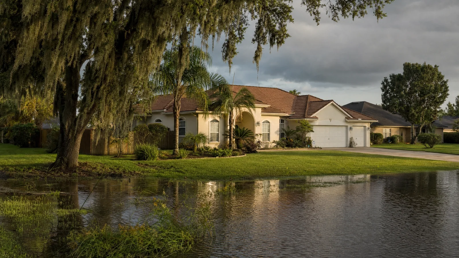 Aerial view of a residential waterfront community in Fleming Island near Doctors Lake — homes most likely to see flood zone reclassification under the 2027 FEMA maps